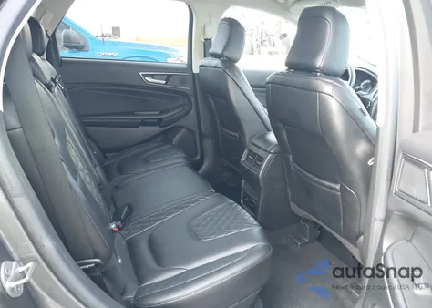 2023 Ford Edge Titanium z USA, uszkodzony, nr VIN 2FMPK4K99PBA27181